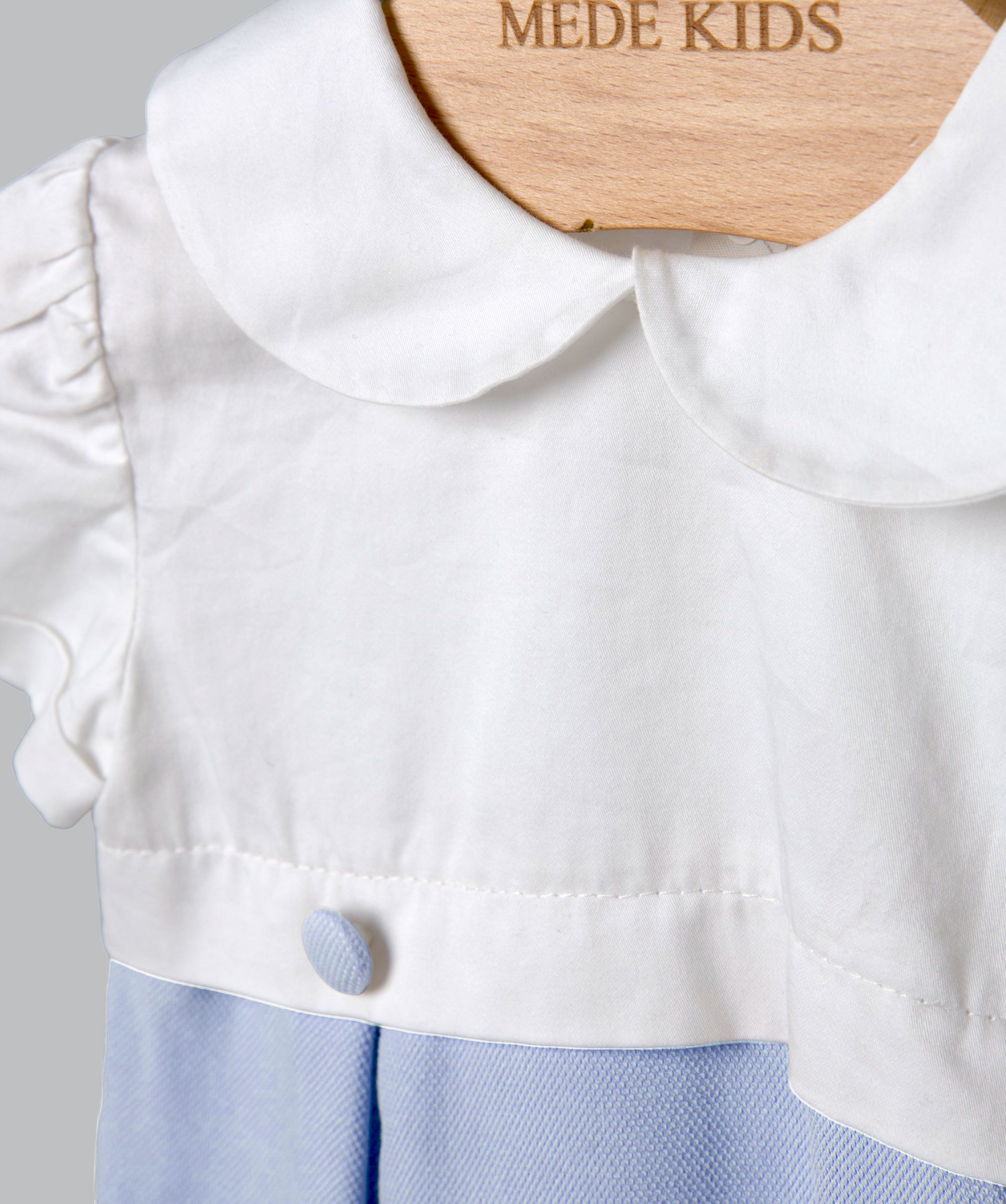 05048 HANDMADE BUTTONED SHORT ROMPER BLUE